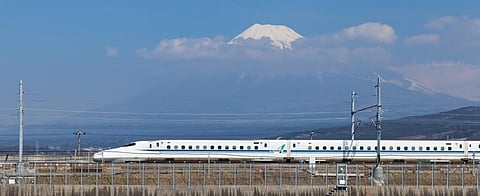 View of Mt Fuji and Tokaido Shinkansen (Bullet Train) in Japan. Photo: Getty Images