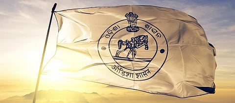 The Odisha state flag waving against the bright sun. Photo: Getty Images