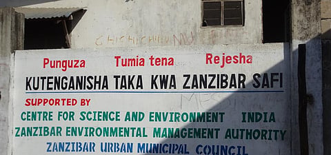 A signboard outside a composting pit in Zanzibar which mentions the Centre for Science and Environment. Photo: Sonia Henam/Swati Singh Sambyal/CSE