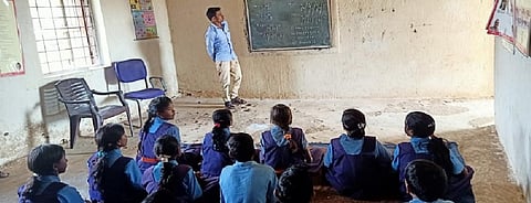 A newly-recruited Baiga teacher taking class in the government primary school at Teliyapani Dhobe village. Photo: Prashanth S Chinnappanavar