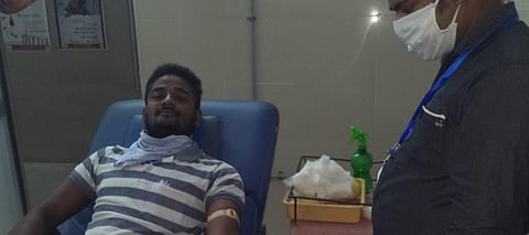 A youth donates blood in Odisha. The state faces a dip in blood donations amid the lockdown Photo: Ashis Senapati