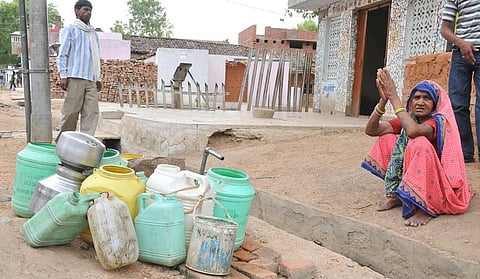 People wait at a water tap in Mahoba, Bundelkhand. Photo: Meeta Ahlawat / CSE