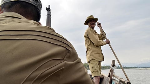 Forest guards patrolling the Nameri river in Assam. Photo: Wikimedia Commons