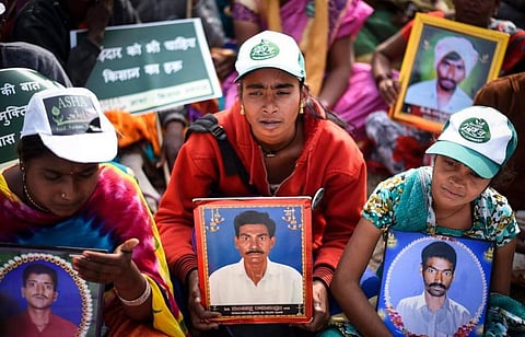 Family members of farmers who committed suicide demonstrate in Delhi (December 2018). Photo: Adithyan PC