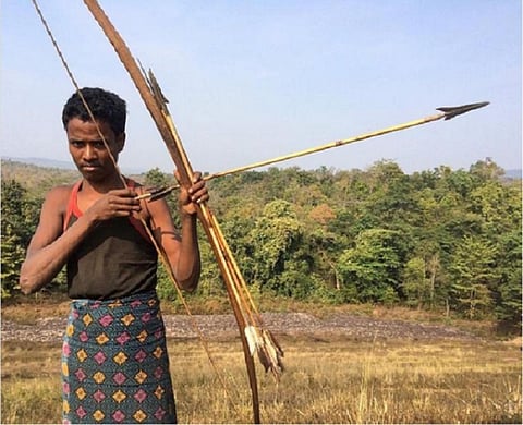 A Kamar Adivasi boy with his bow and arrows. Photo: Vikas Choudhary / CSE
