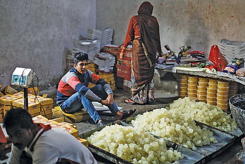 Despite efforts to shift polluting industries away from the area around
the Taj Mahal, several
petha workers operate near the monument