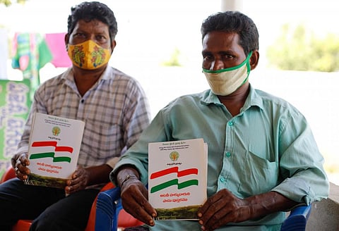 Chimasankurudu Madakam (55) and Kannapraju Madakam (49) have not been able to exercise their land right despite having land deed (in photo). Photo: Vikas Choudhury