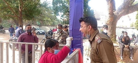 A policeman being tested for COVID-19 in Jharkhand. Photo: Anand Dutt