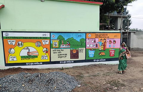 Wall paintings at Baldia Bandh village in Odisha's Dhenkanal district to make people aware of safe sanitation. Village residents now send their faecal sludge to an urban treatment plant (Photograph: Swati Bhatia)