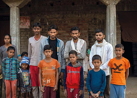 Sudhir Yadav (second from right) of Satvahini village and his brothers have been trying fruitlessly to get separate ration cards for their families. Photo: Vikas Choudhary / CSE