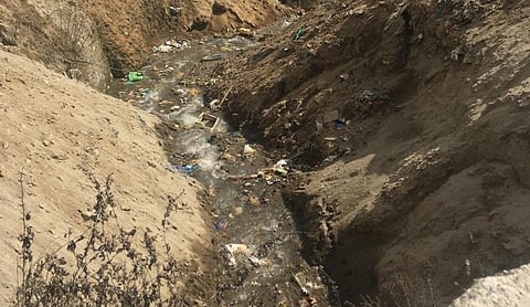 A garbage-filled watercourse in Tawang, Arunachal Pradesh. Photo: Iris Ruyu Lin
