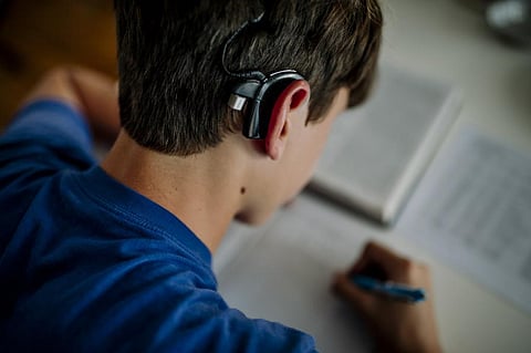 A patient’s age upon receiving a cochlear implant can influence the technology’s effectiveness. Cavan Images/Cavan via Getty Images