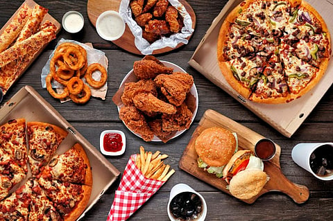 The world is hooked on junk food: How big companies pull it off