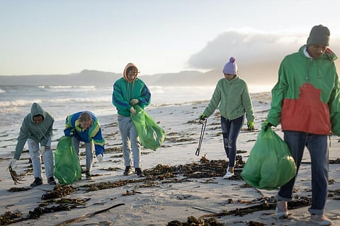 Climate change believers are more likely to cooperate with strangers, new research finds
