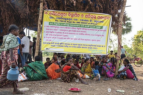 Women in Angul protesting along with men for better compensation packages from mining companies. Photo: Jennifer Kishan.