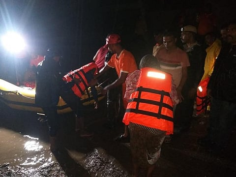 NDRF team rescuing families trapped in Nani Sair village of Karajan taluka following the release of water in Narmada Dam. Photo: Twitter@DDNewsGujarati