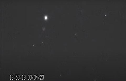 Three satellites are visible in this screengrab from video shared by Nature via Marco Langbroek, Delft Technical University. The brightest spot is BlueWalker 3