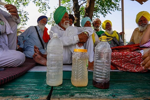 Villagers from around Zira town of Punjab’s Ferozepur district earlier showed Down To Earth the polluted water samples they allegedly receive in their taps. Photo: Vikas Choudhary / CSE