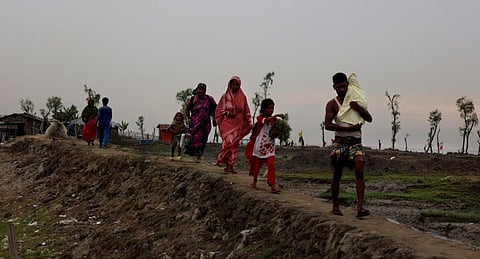 Residents of Chattogram in Bangladesh move to safer ground as Cyclone Mocha approaches. Photo: iStock