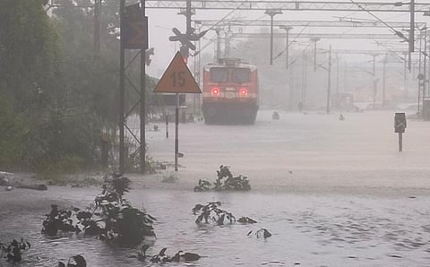 A railway coach at inundated Egmore station, Chennai.