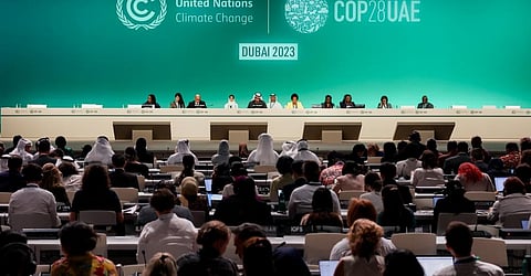 Speakers onstage during the Global Climate Action High-Level Event (closing): Uniting on the Pathway to 2030 and Beyond at the UN Climate Change Conference COP28 at Expo City Dubai on December 11, 2023, in Dubai, United Arab Emirates. (Photo by COP28 / Christopher Pike)