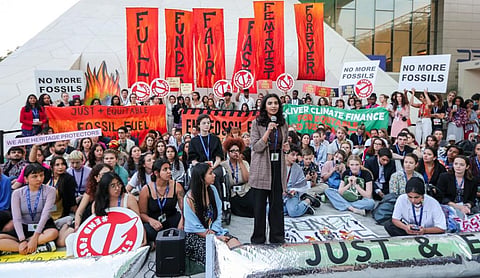Climate Action Network International action at the UN Climate Change Conference COP28 at Expo City Dubai on December 12, 2023, in Dubai, United Arab Emirates. (Photo by COP28 / Christopher Edralin)