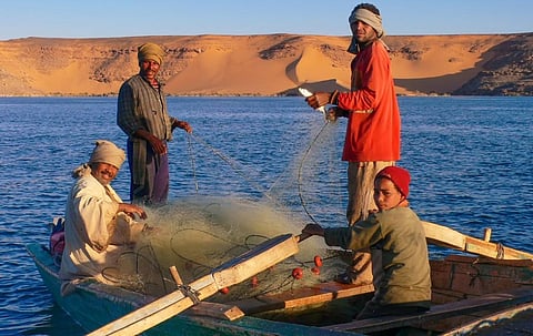 Members of Egypt's Nubian community fish in Lake Nasser, the reservoir created by the Aswan High Dam in Upper Egypt, near the Sudanese border. Photo: iStock