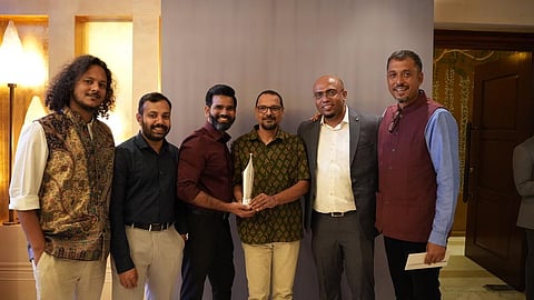 The DTE Multimedia team with the award. Photo: Prabhat Kumar / CSE