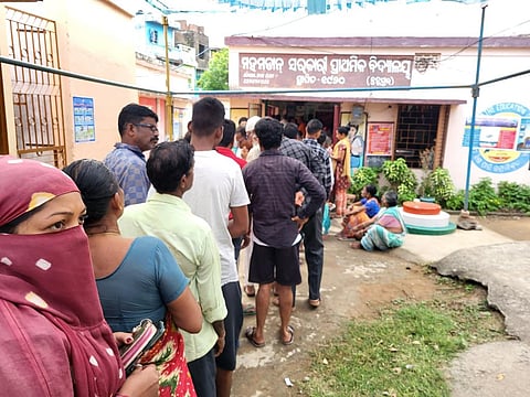Voters in front of the polling booth in Behrampur, Odisha. Photo: Author provided