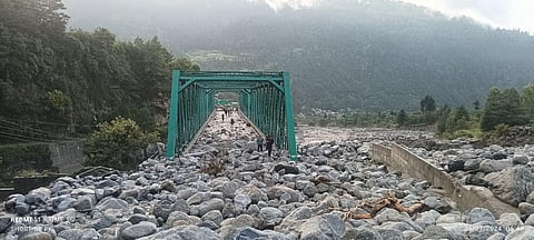 The Manali-Leh Highway blocked with rocks after heavy rainfall in Palchan.