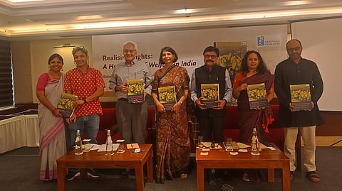 Azim Premji University launched Realising Rights: A Handbook of Welfare in India at India Habitat Centre, New Delhi, on June 26, 2026. From left to right: Dipa Sinha, Arjun Jayadev, AK Shiva Kumar, Arti Ahuja, PV Ramesh, Shobhana K Nair, and Rajendran Narayanan.
