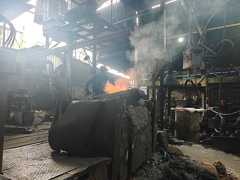 A foundry in Kolhapur, Maharashtra. The facility uses electric furnaces to melt iron for the production of cast metal components.