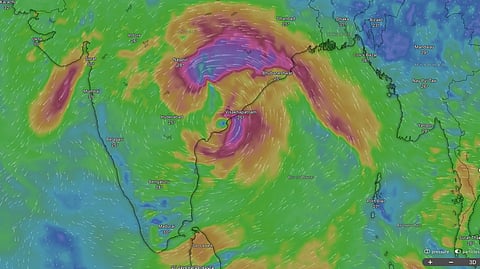 Interaction between Cyclone Arnab and a low-pressure area over the Bay of Bengal.