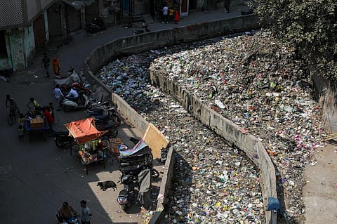 A 5-kilometre-long drain has become a dumping ground for the residents of Gautampuri, Bhajanpura and Usmanpur localities in Delhi's North East district. Single-use plastic carry bags, banned in the country last year, continue to find their way into the drain. Residents complain that the drain choked with garbage is also a hotbed of mosquito breeding activity throughout the year. Photo: Vikas Choudhary / CSE