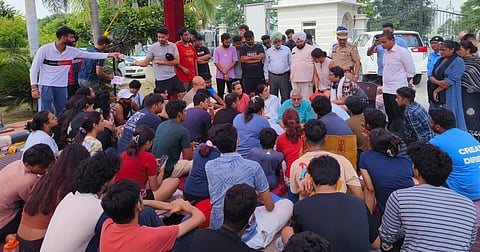 MP with the protesting students