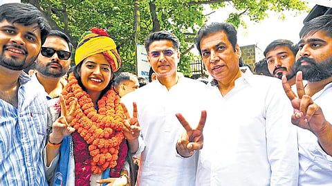 AICC general secretary Sachin Pilot with DPCC president Devender Yadav campaigning at Miranda House college on Monday