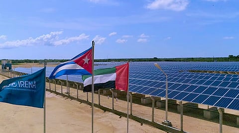 In blackout-weary Cuba, a solar charging station powers daily life