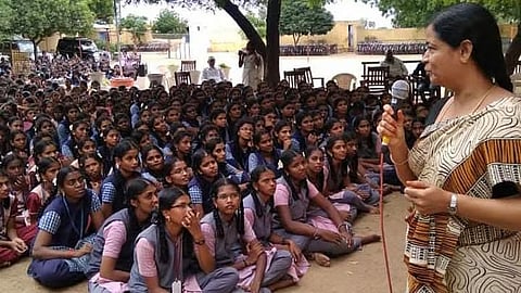 S Vijayarani Meenakshi interacts with students of a government-aided Girls Higher Secondary School in Dhalavaipuram during an awareness programme on menstruation, gender stereotypes and empathy.