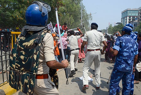 Patna: Police carry out a lathicharge on candidates preparing for the Bihar Public Service Commission (BPSC) Teacher Recruitment Examination (TRE) 4.0 during a protest demanding the release of the official recruitment notification, near JP Golambar in Patna, Bihar on Friday, May 8, 2026. (Photo: IANS)