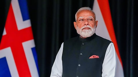 Prime Minister Narendra Modi looks on, on the occasion of his meeting with Iceland's Prime Minister Kristrún Frostadóttir, at a hotel in Oslo.