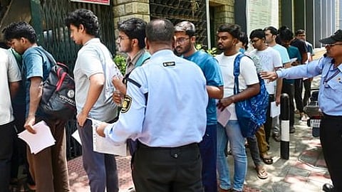 Bengaluru: Students undergo security check as they arrive to appear for the National Eligibility cum Entrance Test (NEET-UG) 2026 at an examination centre in Bengaluru on Sunday, May 3, 2026.