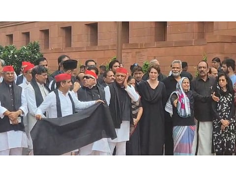 Oppn MPs wear black to parliament, stage protest against 'police brutality' on student protestors