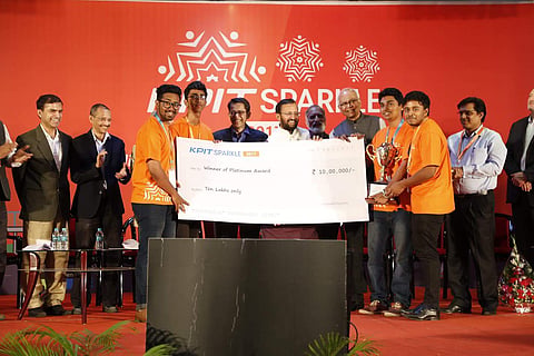 Prakash Javadekar, Union Minister for HRD, felicitating the Platinum Award winning team