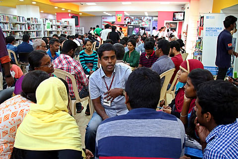 At a typical Human Library event, like this one at the British Council Library in Chennai, people gather around and talk to the 'book' |Pics: Romani Agarwal