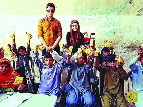 Hasan and Shireen with their students