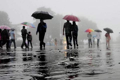 A record 40mm rainfall on Tuesday in the port city of Manganluru inundated several areas, including roads and housing colonies