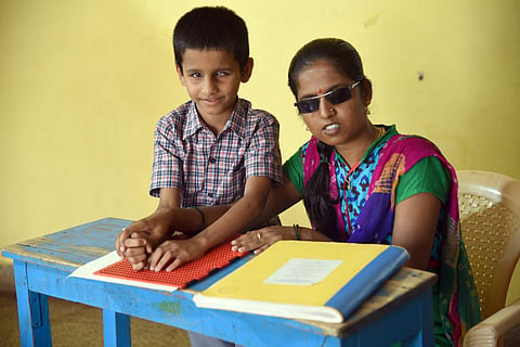 Ashwini with a student