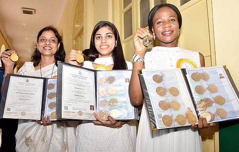 (Right to left) Emelife Stella Chinelo, Sanjana Darla P and Meera Manahar Rao Anasane with their gold medals (Pic: Express)