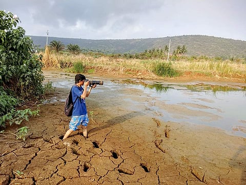 Vivek doing what he does best, photographing | (Pic: Vivek Rathod)