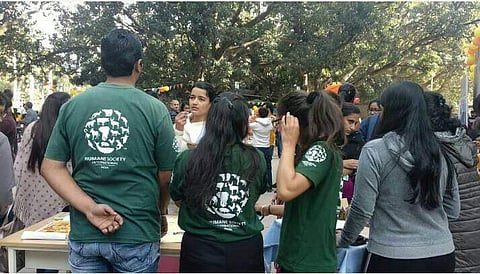 The HSI volunteers with the students